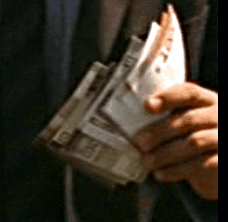 File:Wad of cash with possible 10 and 100 cubit notes visible.gif