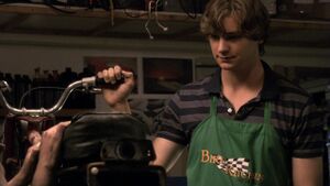 Caprica - Gravedancing - Keon Gatwick in Bike Kitchen Apron.jpg