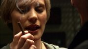Thumbnail for File:TRS - Water - Kara Smoking a Fumarella Leaf Cigarette.jpg