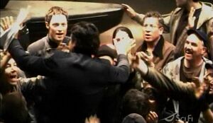 Adama being carried.jpg