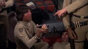 Thumbnail for File:BSG-TOS - Gun on Ice Planet Zero Part I - Apollo with Thane's Hand Mine.jpg