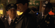 Thumbnail for File:Caprica - Rebirth - Mendez and Partner with Epaulette Beacon.png