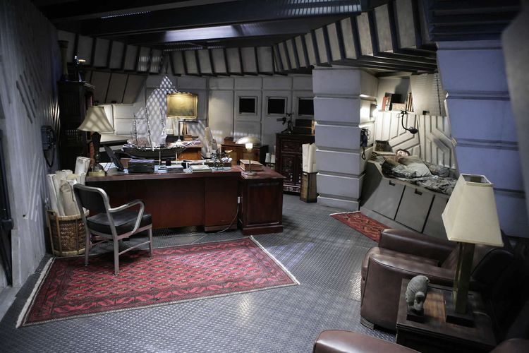 Adama's bunk to the left of the desk.