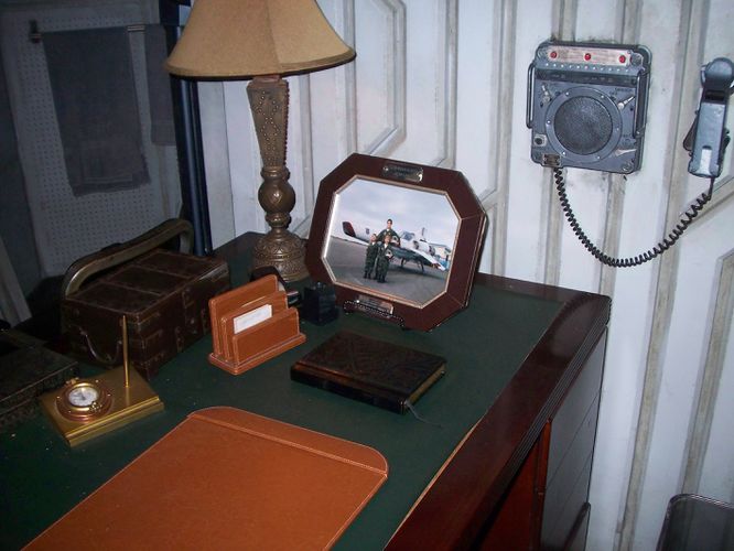 The top of Adama's desk, with the family picture.