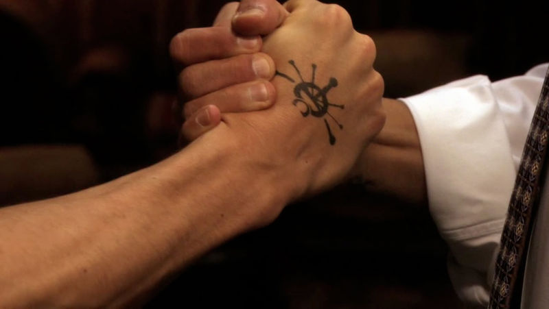 File:Adama brothers shake hands, 1x15.jpg