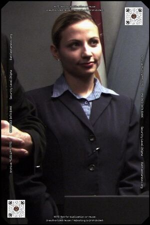 Baltar's Presidential Aide 2 portrayed by Jennefer Jenei.