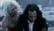 Thumbnail for File:Baltar and Six finding Hera.jpg