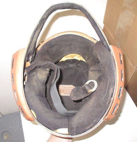 A D Squadron helmet from Galactica 1980, which was repurposed for the attraction. It is identified as "Helmet #6". Interior view, showing the padding and helmet strap.