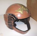 A D Squadron helmet from Galactica 1980, which was repurposed for the attraction. It is identified as "Helmet #6". Right side view.