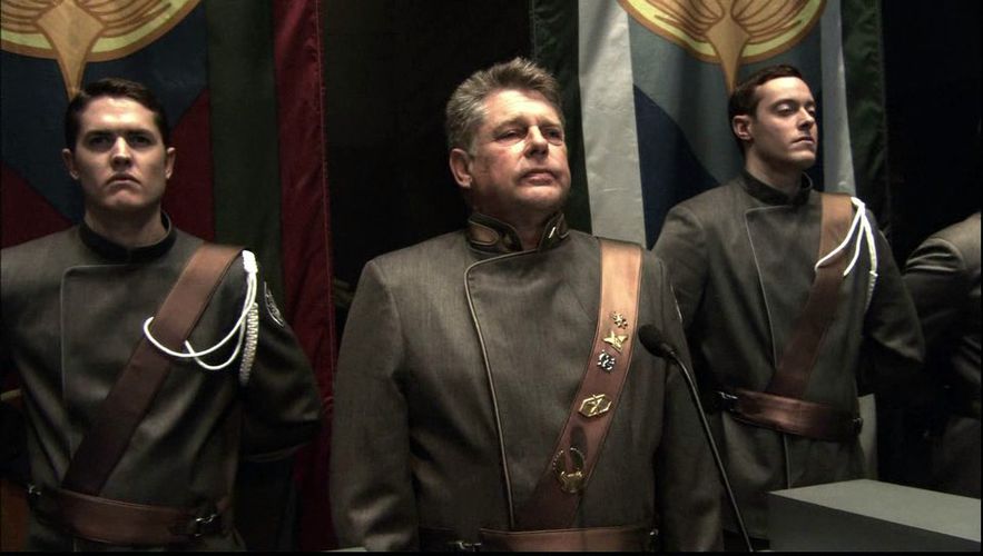 A different type of shoulder cord at Cain's funeral (TRS: "Resurrection Ship, Part II").