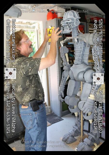 Gary Hutzel with the practical, static full-size U-87, during early stages of its construction circa 2009 CE.