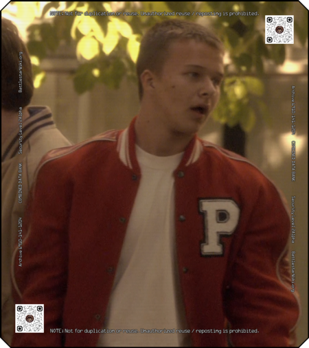 Summary Fidgety student outside of Promethia High School in a Promethia varsity jacket, as seen by Joseph Adama from his…