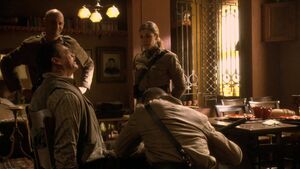 Caprica - The Dirteaters - Herac Soldiers Torture William Adama Sr.jpg