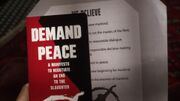 Thumbnail for File:Demand Peace 1.jpg