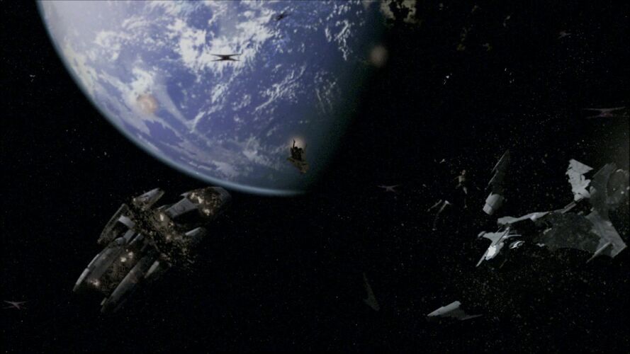 A destroyed Galactica type battlestar near Caprica (TRS: "Miniseries").