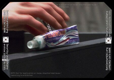 Kara "Starbuck" Thrace presents the last known tube of Felgercarb toothpaste on the briefing room podium (TRS: "Someone to…