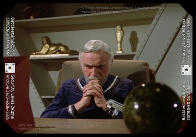 Commander Adama wearing a wrist computron aboard Galactica (1980: "Spaceball").