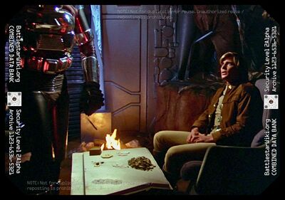 Cyrus leaves after uncovering the fact that Starbuck has been cheating at pyramid (1980: "The Return of Starbuck").