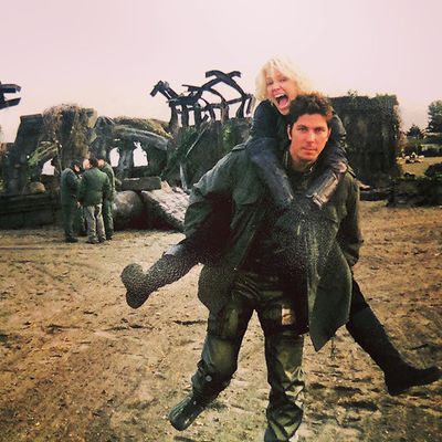 Tricia Helfer and Michael Trucco clowning around behind the scenes, while shooting on location in the manufactured ruins of The Thirteenth Colony.