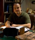 Thumbnail for File:Joe at Adama's desk.jpg