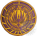 Ministry of Defense patch, worn by the Armistice Officer in the Miniseries and Kendra Shaw in "Razor".