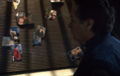 William Adama goes over the once-brimming walls of the memorial hallway during the scuttling of Galactica, coming across a photo of the abducted Hera Agathon with her mother, Sharon Agathon (TRS: "Daybreak, Part I").