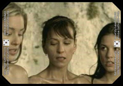 Moosehead Beer commercial airing in 2003 featuring Warnyca (left) and Leah Cairns (right).