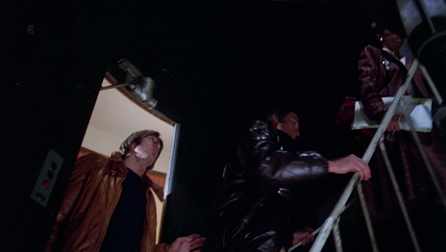 Dillon, Troy and Jamie Hamilton enter the inside of the Zeiss telescopes room in Griffith Park Observatory.