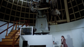 Dillon, Troy and Jamie Hamilton enter the inside of the Zeiss telescopes room in Griffith Park Observatory.