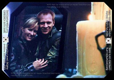 Nora Farmer and Tucker "Duck" Clellan in a photo during their tour of duty aboard Galactica (TRS: "Occupation").