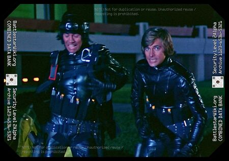 Apollo and Starbuck after parachuting to the surface of Gamoray .