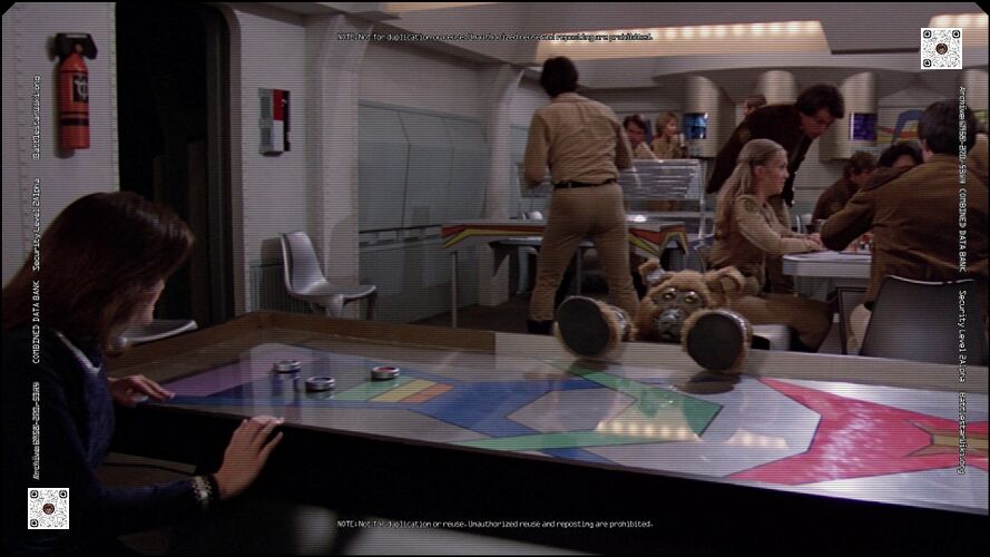 Boxey defeats Athena in a game of compartment bulyarks.