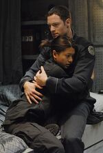 Thumbnail for File:Season 3 - Promo - AMOS - Helo and Sharron.jpg
