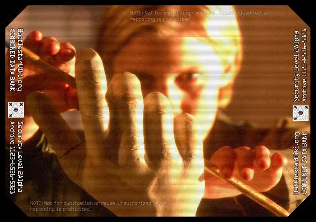 File:Starbuck-Kobols Last Gleaming pt2.jpg