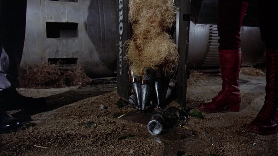 Bottles of contraband ambrosa dumped upon Proteus' ground. (TOS: "The Long Patrol").