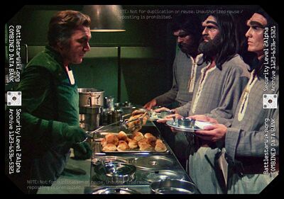 Baltar attempts to curry favor of Borellian Nomen with Borellian desert layers (in reality, a Cornish game hen) aboard the Prison Barge (TOS: "Baltar's Escape").