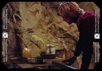 Starbuck awakens in a cell whose rock walls are festooned with various drawings from a silent artist (TOS: "The Long Patrol").