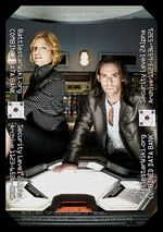 Thumbnail for File:TRS - Maxim Shoot - Tricia Helfer and James Callis.jpg