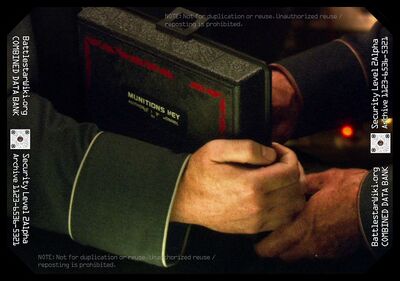 Admiral William Adama retrieves the munition key to activate Galactica's nuclear arsenal during the Battle of the Algae Planet (TRS: "Rapture").