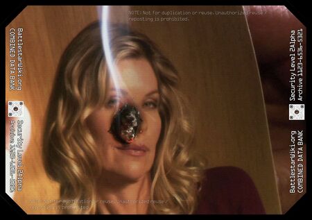 Saul Tigh burning his cigarette through a picture of Ellen Tigh, as formally cast by Kate Vernon (TRS: "Tigh Me Up, Tigh Me…