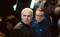 The Plan - Tigh and Adama in Galactica Corridor.jpg
