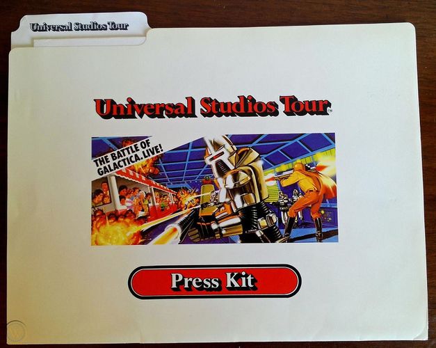 Folder for the press kit, with full color artist rendering of the attraction's "laser battle."
